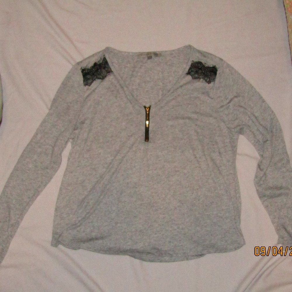 Women's knit zip front top with lace